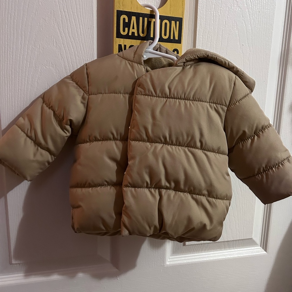 Baby jacket neutral color and gender. Washed but never worn